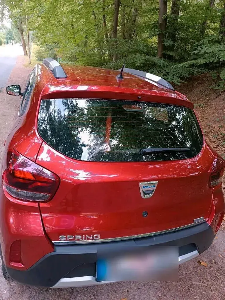 Używany Dacia Spring Comfort Plus 33 kW (45 KM) 2022 Czerwony Hatchback