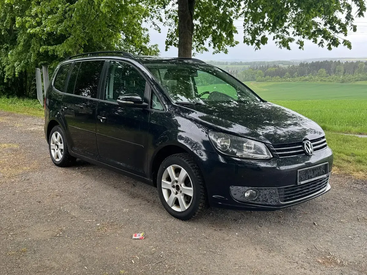 Gebraucht VW Touran Comfortline 105 PS (77 kW) 2011 Schwarz Van / Kleinbus