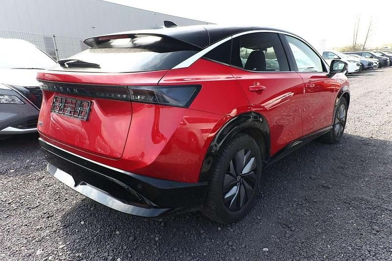 Gebraucht Nissan Ariya 160 kW (218 PS) 2022 Passion rot / schwarz metallic SUV