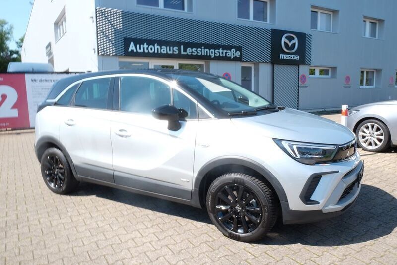 Grau Gebraucht 2023 Opel Crossland Design & Tech SUV | 18.959 € (Fairer Preis) - Bild 1/4