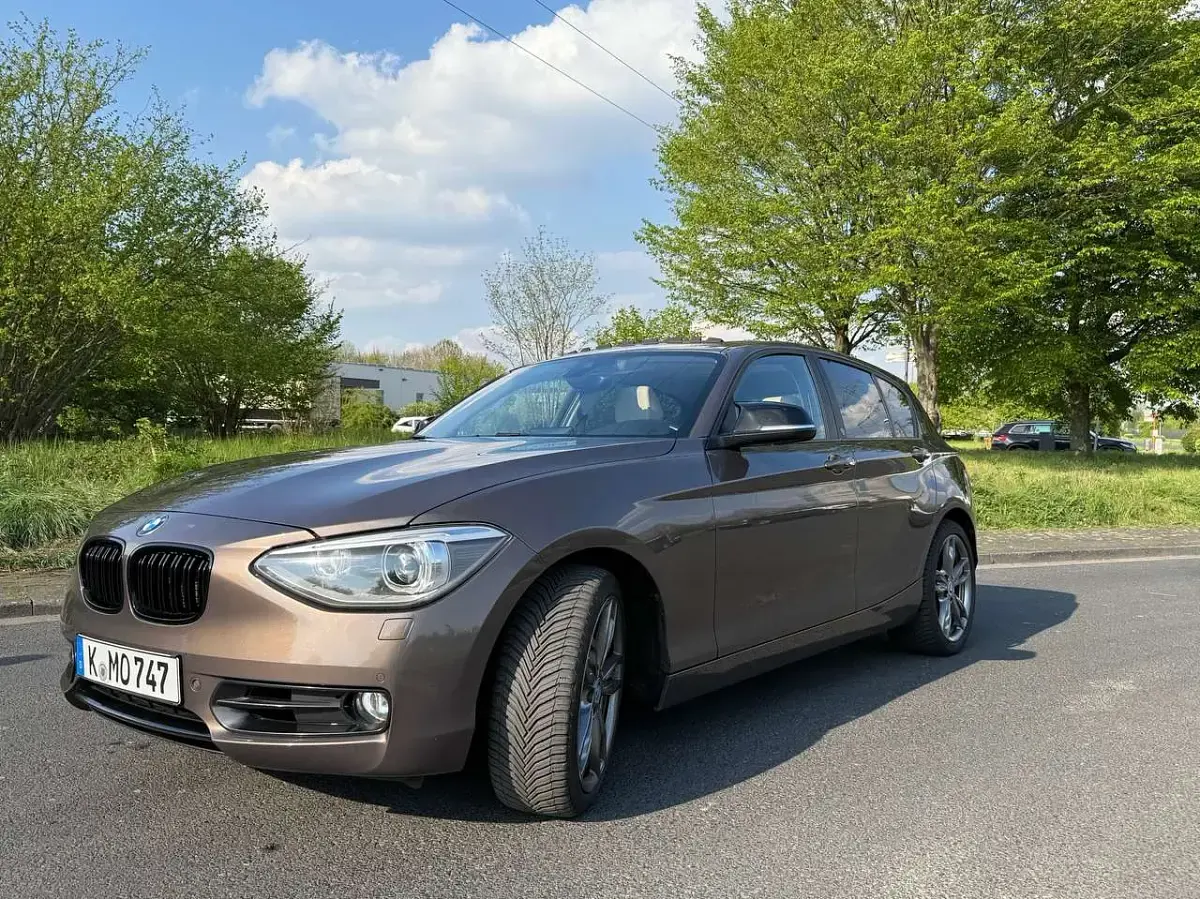 Gebraucht BMW 118 Sport Line 170 PS (125 kW) 2015 Bronze Kleinwagen