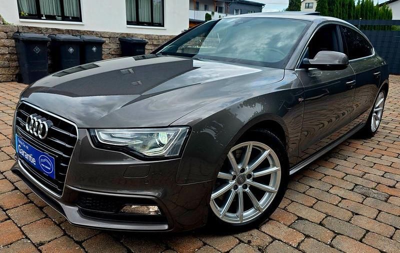 Grau Gebraucht 2016 Audi A5 Sportback S-Line Limousine | 17.499 € (Superpreis) - Bild 1/4