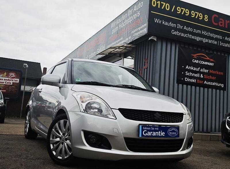 Silber Gebraucht 2012 Suzuki Swift Comfort Coupé | 6.299 € (Fairer Preis) - Bild 1/4