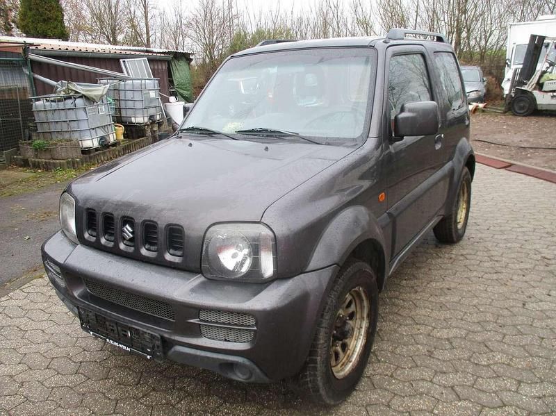 Grau Gebraucht 2010 Suzuki Jimny Comfort SUV | 2.998 € (Superpreis) - Bild 1/4