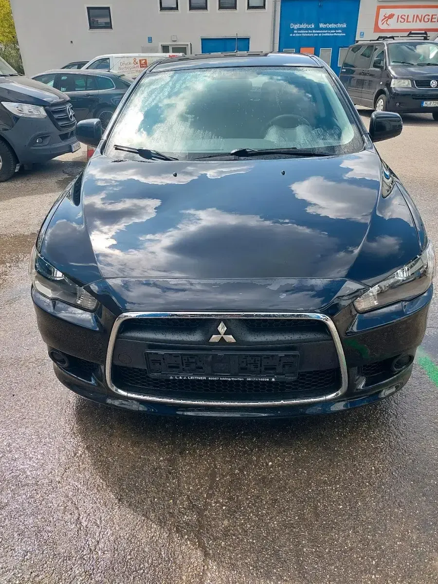 Second-hand Mitsubishi Lancer 109 CP (80 kW) 2010 Negru Berlinǎ