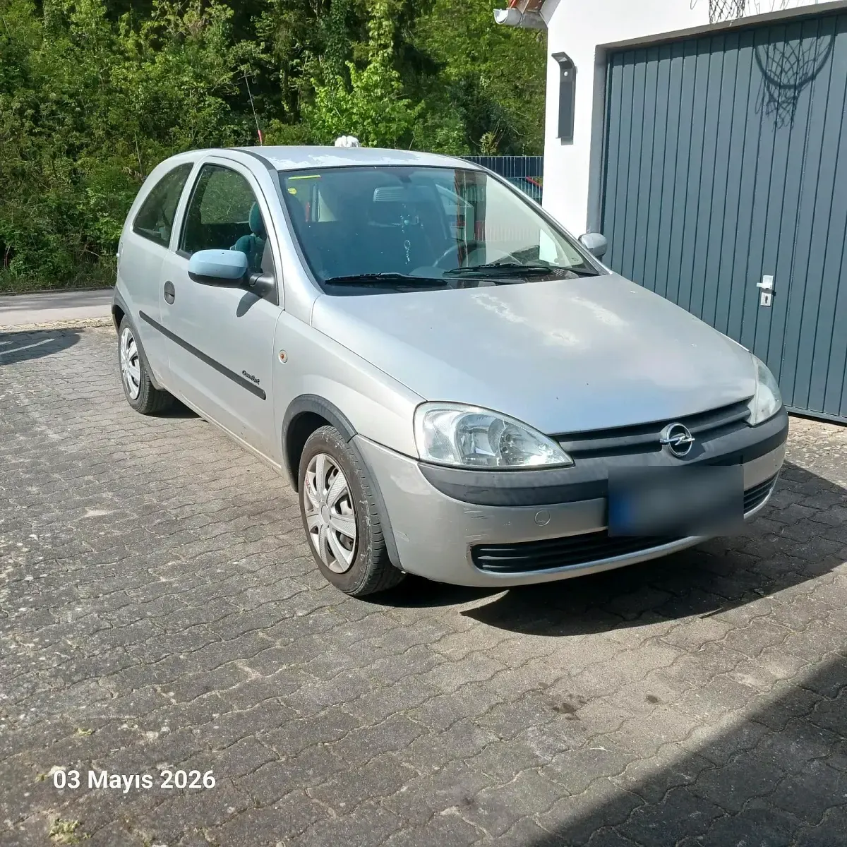 Używany Opel Corsa 75 KM (55 kW) 2001 Srebrny Hatchback