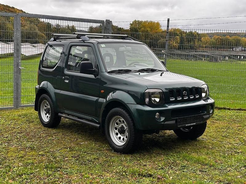 Grün Gebraucht 2001 Suzuki Jimny SUV | 6.290 € (Fairer Preis) - Bild 1/4