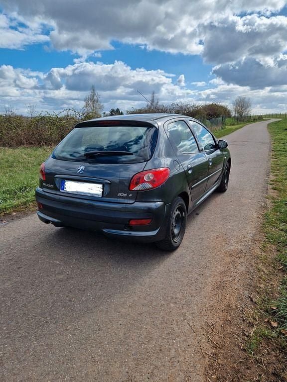 Gebraucht Peugeot 206+ 73 PS (53 kW) 2011 Grau Kleinwagen