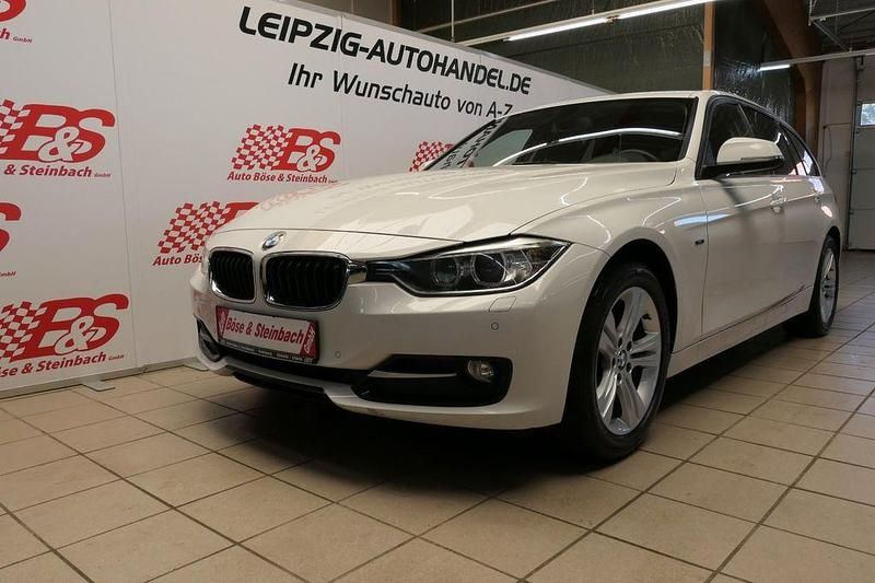 Alpinweiss iii Gebraucht 2014 BMW 318 Sport Line Kombi | 9.874 € (Fairer Preis) - Bild 1/4