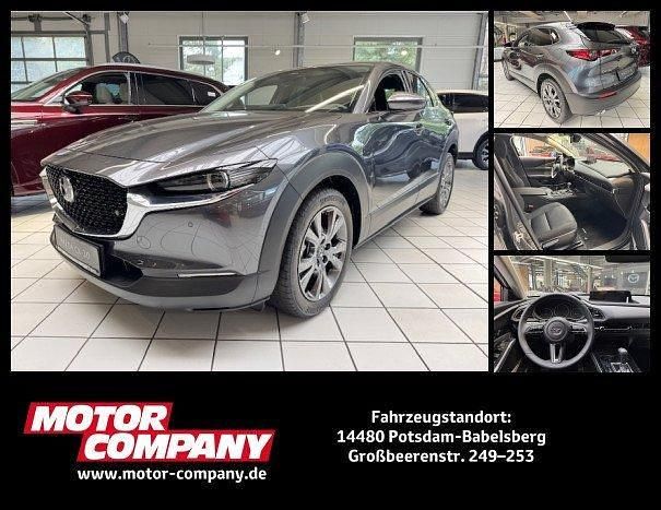 Grau Neu 2024 Mazda CX-30 Exclusive-Line SUV | 34.000 € - Bild 1/4