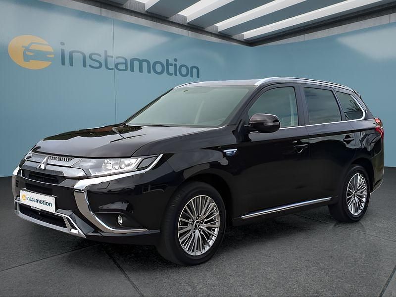 Schwarz Gebraucht 2021 Mitsubishi Outlander P-HEV SUV | 22.499 € (Fairer Preis) - Bild 1/4
