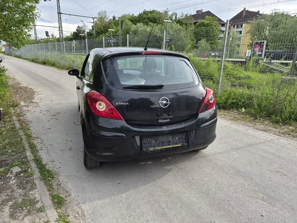 Używany Opel Corsa Edition 80 KM (58 kW) 2009 Czarny Hatchback