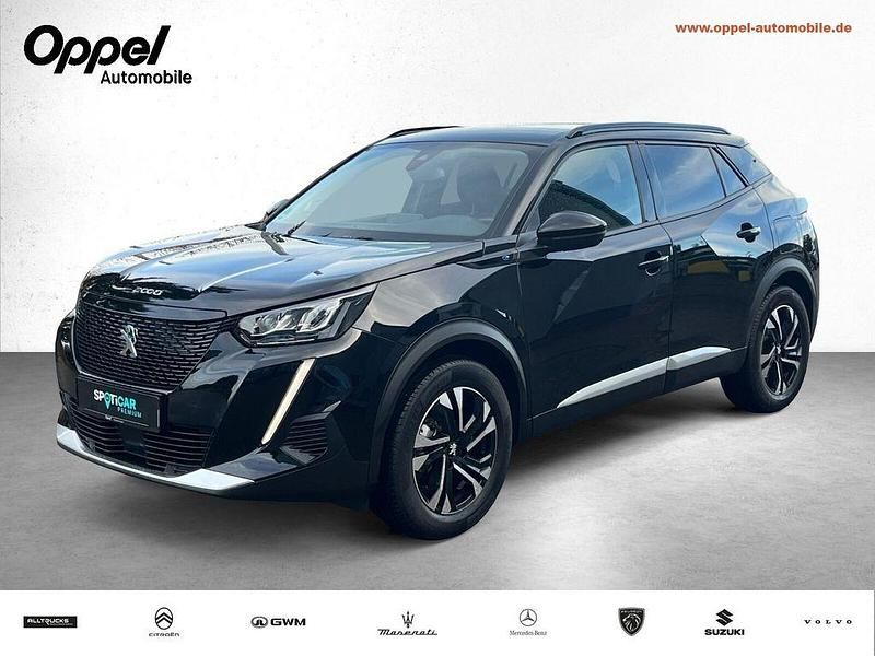 Lackierung schwarz perla nera/typ aussenverkleidung metalliclackierung Gebraucht 2021 Peugeot e-2008 Allure SUV | 17.990 € (Fairer Preis) - Bild 1/3