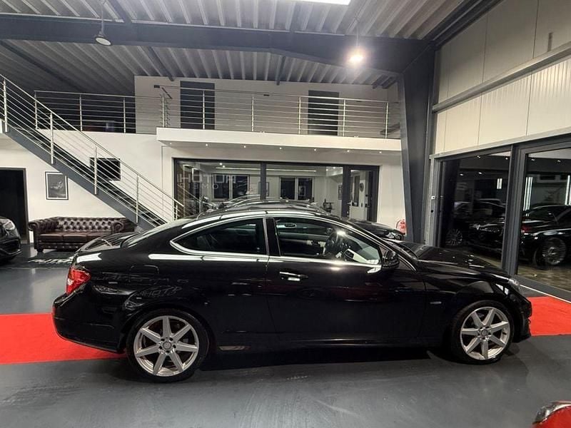 Gebraucht Mercedes C180 AMG 156 PS (114 kW) 2011 Schwarz Coupé