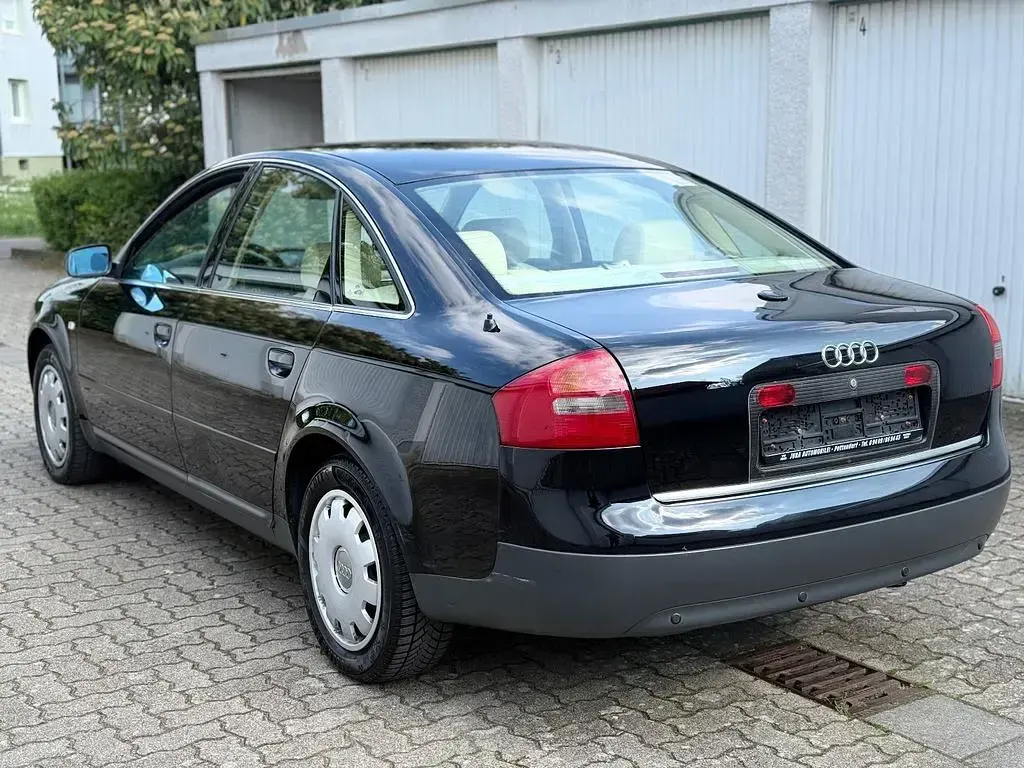 Używany Audi A6 S-Line 165 KM (121 kW) 1998 Czarny Sedan/Limuzyna