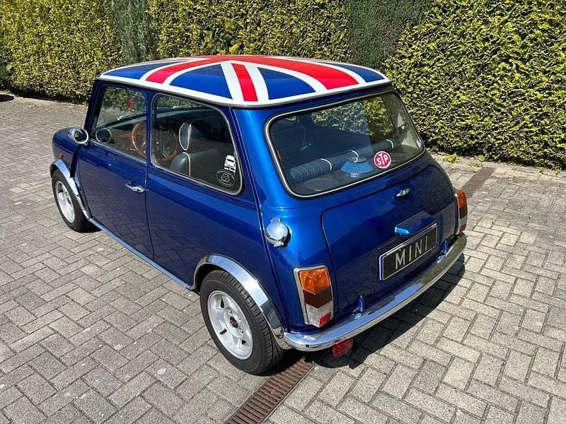 Second-hand Mini 1300 61 CP (44 kW) 1991 Albastru Hatchback