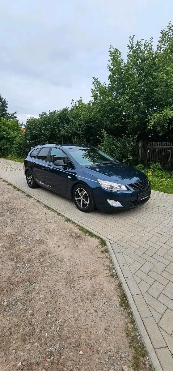 Gebraucht Opel Astra 125 PS (91 kW) 2011 Blau Kombi