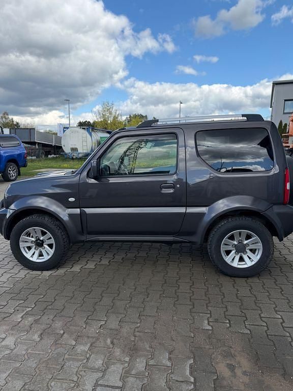 Second-hand Suzuki Jimny Style 86 CP (63 kW) 2012 Gri SUV