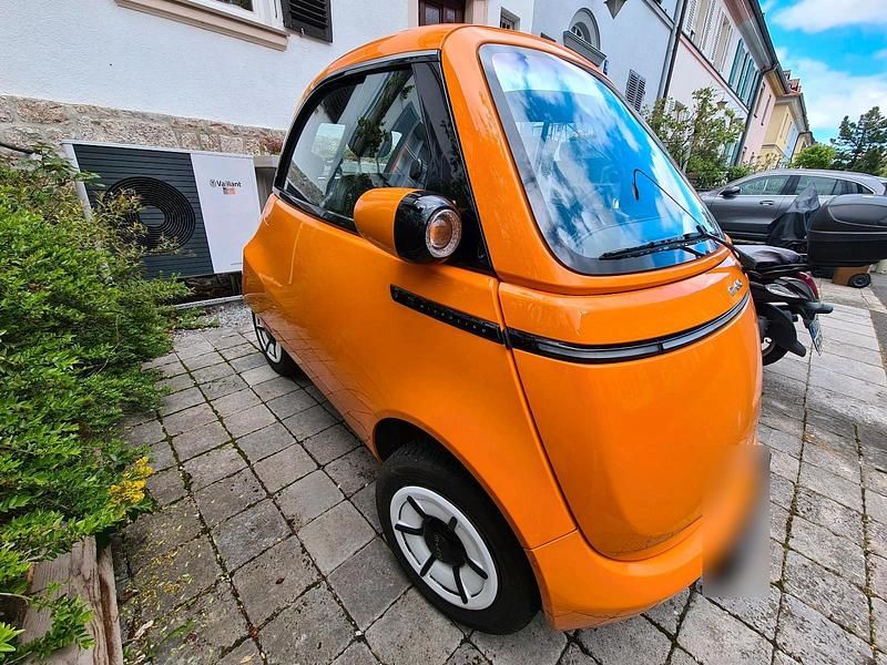 Second-hand Micro Microlino 12 kW (17 CP) 2023 Portocaliu Hatchback