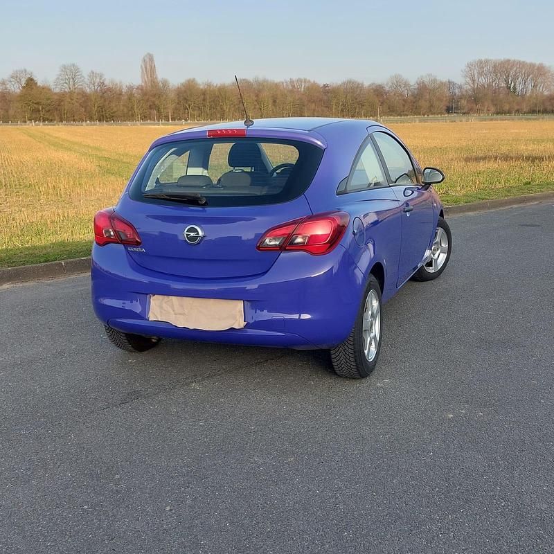 Używany Opel Corsa Edition 69 KM (50 kW) 2017 Purpurowy Hatchback