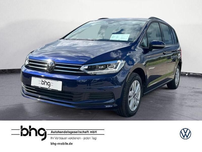 Atlantik blue metallic Gebraucht 2024 VW Touran Comfortline Van / Kleinbus | 35.730 € (Fairer Preis) - Bild 1/4