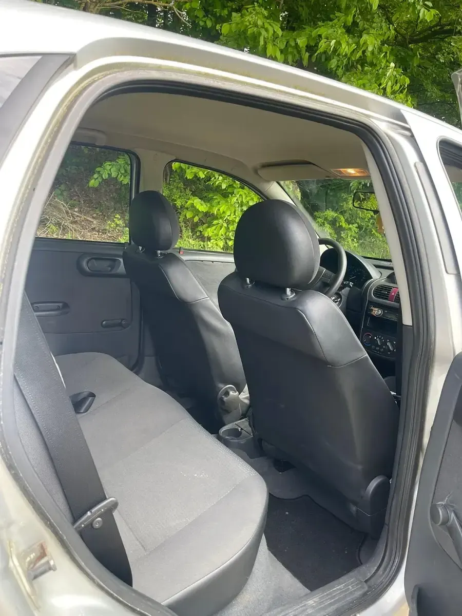 Używany Opel Corsa 75 KM (55 kW) 2003 Srebrny Hatchback