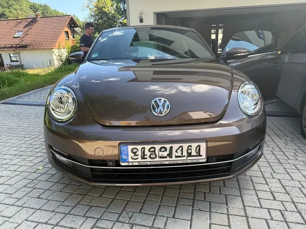 Gebraucht VW Beetle Design 105 PS (77 kW) 2012 Braun Kleinwagen