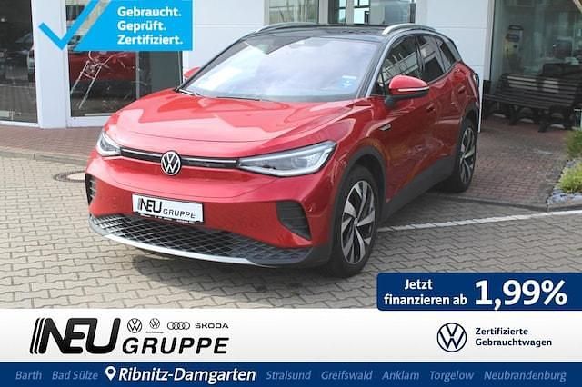 Kings red metallic / schwarz Gebraucht 2023 VW ID.4 Pro Performance SUV | 31.479 € (Guter Preis) - Bild 1/4