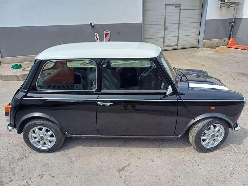 Gebraucht Mini 1300 63 PS (46 kW) 1994 Schwarz Kleinwagen