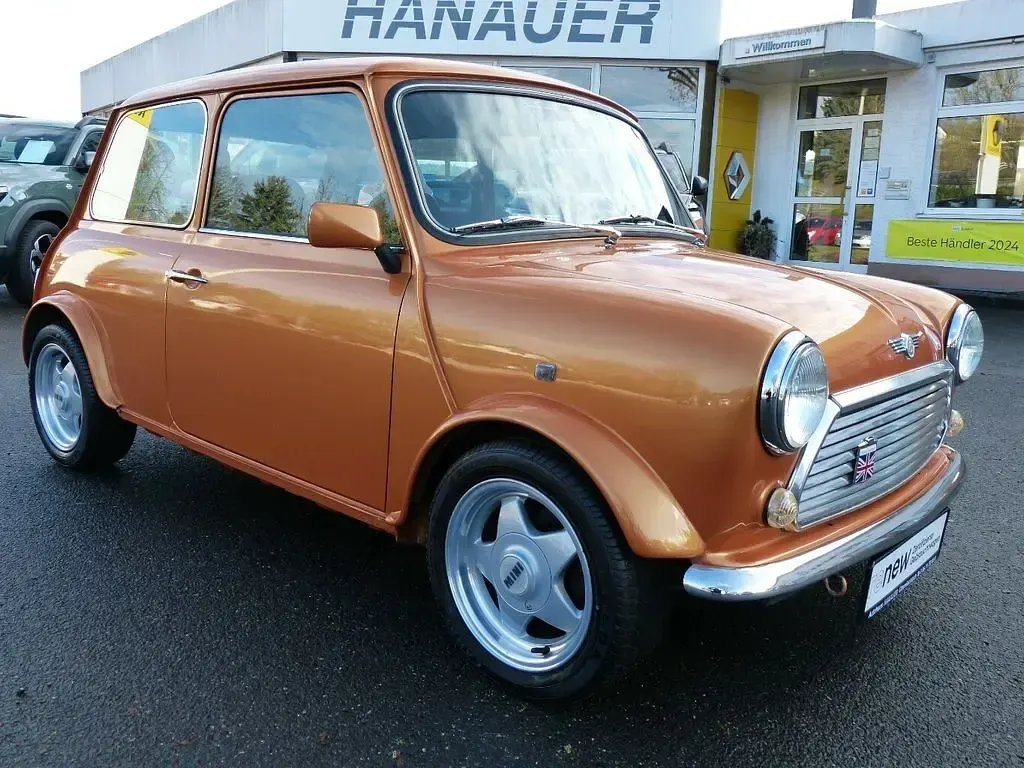 Używany Mini Cooper 63 KM (46 kW) 1995 Pomarańczowy Hatchback