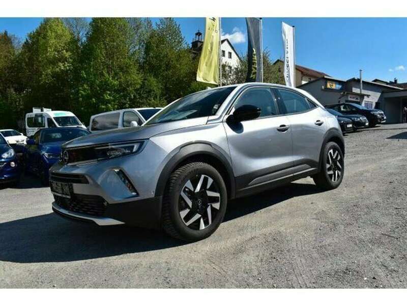 Gebraucht Opel Mokka-e Elegance 100 kW (136 PS) 2021 Kontrast grau/dach weiß SUV