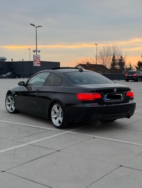 Schwarz Gebraucht 2007 BMW 335 Shadowline Coupé | 14.900 € - Bild 1/4