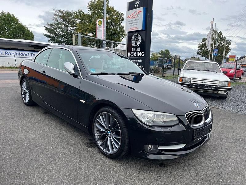Schwarz Gebraucht 2013 BMW 318 Cabriolet Performance Cabrio | 12.990 € (Fairer Preis) - Bild 1/4