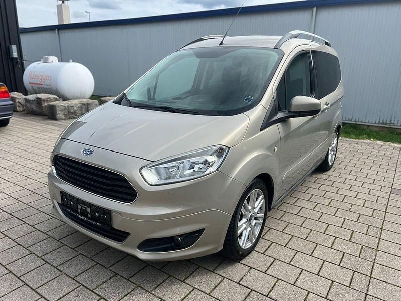 Grau Gebraucht 2015 Ford Tourneo Courier Titanium Van / Kleinbus | 5.999 € (Superpreis) - Bild 1/4