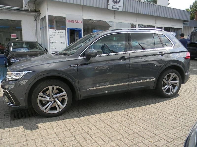 Delfingrau (metallic) Gebraucht 2021 VW Tiguan R-line SUV | 37.998 € (Fairer Preis) - Bild 1/4