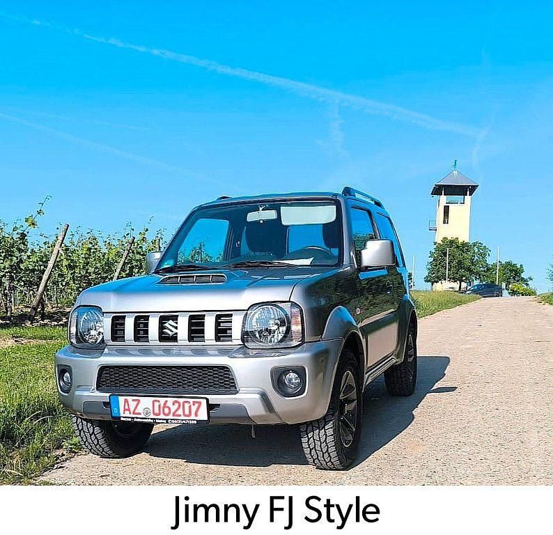 Silber Gebraucht 2015 Suzuki Jimny Style SUV | 19.490 € (Etwas zu teuer) - Bild 1/2