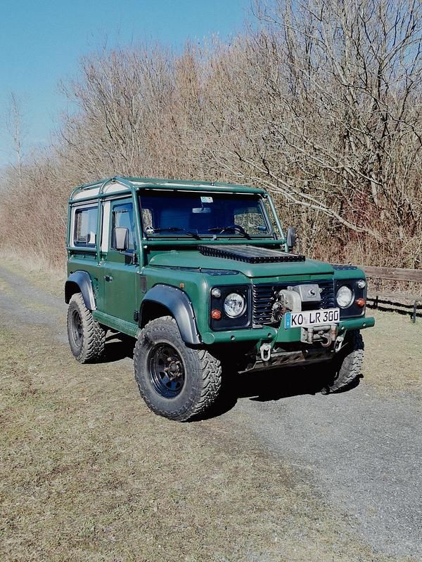Grün Gebraucht 1998 Land Rover Defender SUV | 23.999 € (Superpreis) - Bild 1/4