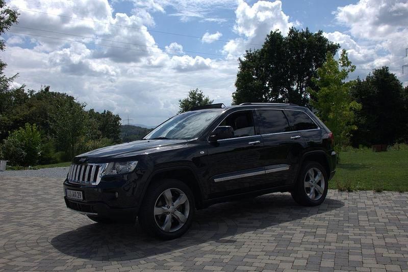 Schwarz Gebraucht 2012 Jeep Grand Cherokee Overland SUV | 20.500 € - Bild 1/4