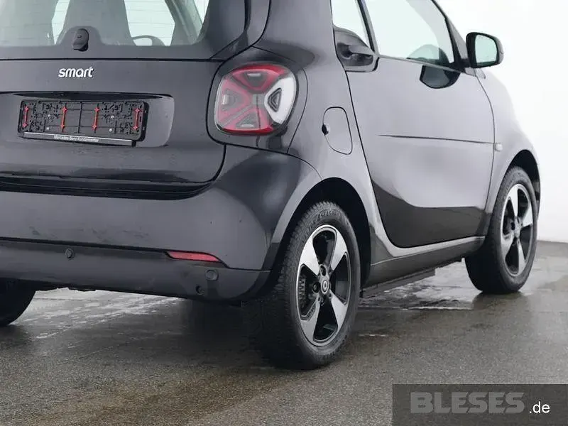 Gebraucht Smart ForTwo Coupé Exclusive 60 kW (82 PS) 2024 Bodypanels in black Kleinwagen