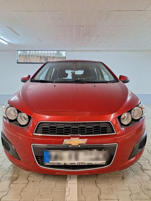 Gebraucht Chevrolet Aveo LT 101 PS (74 kW) 2012 Rot Kleinwagen