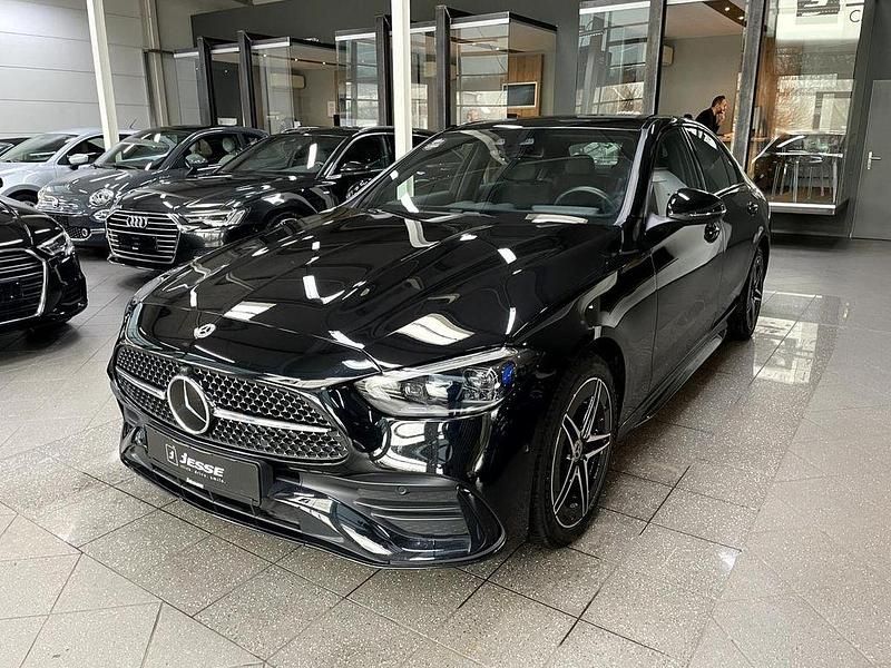 Obsidianschwarz metalliclack (metallic) Gebraucht 2023 Mercedes C300e AMG Limousine | 39.990 € (Fairer Preis) - Bild 1/4