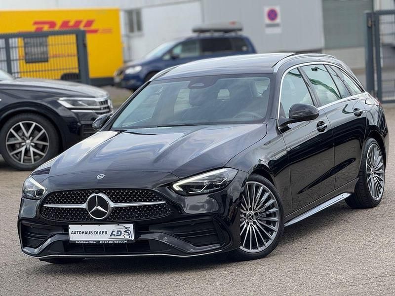 Schwarz Gebraucht 2023 Mercedes C200 AMG line Kombi | 36.900 € (Teuer) - Bild 1/4