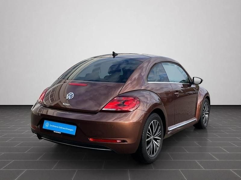 Gebraucht VW Beetle Allstar 105 PS (77 kW) 2016 Dark bronze metallic (metallic) Kleinwagen