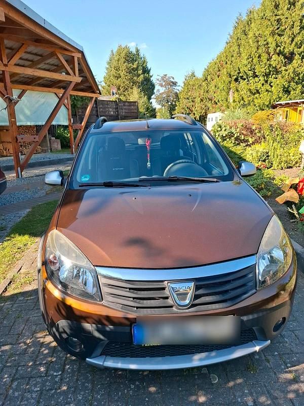 Braun Gebraucht 2012 Dacia Sandero Stepway Kleinwagen | 5.850 € (Guter Preis) - Bild 1/4