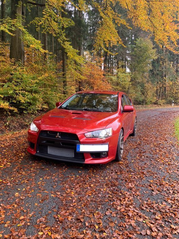 Rot Gebraucht 2010 Mitsubishi Lancer Limousine | 42.900 € - Bild 1/4