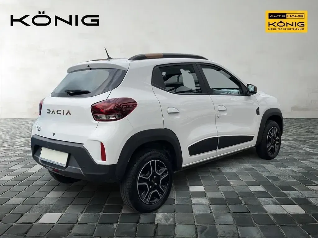 Gebraucht Dacia Spring Essentiel 19 kW (26 PS) 2023 Kaolin weiß Kleinwagen