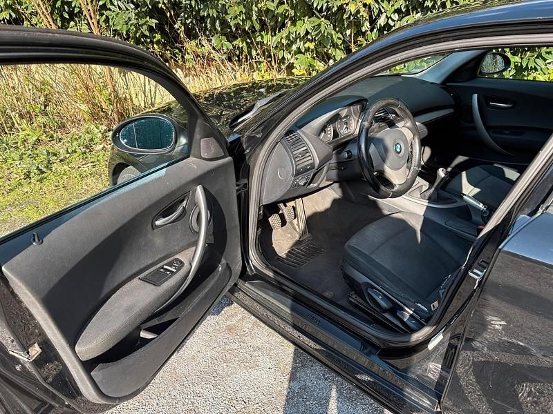Second-hand BMW 116 115 CP (84 kW) 2006 Negru Hatchback