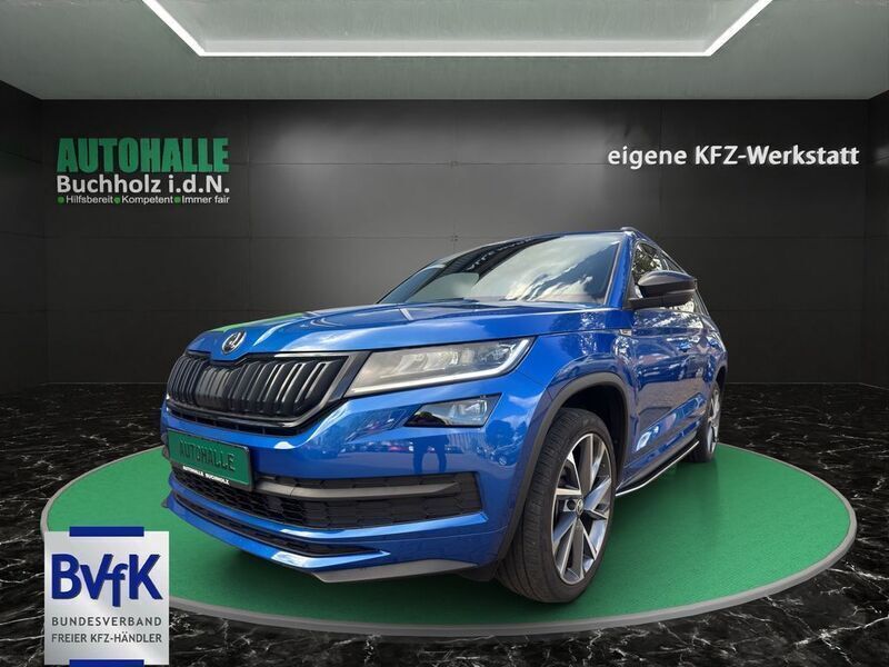 Race blue metallic Gebraucht 2021 Skoda Kodiaq SportLine SUV | 31.980 € (Guter Preis) - Bild 1/3