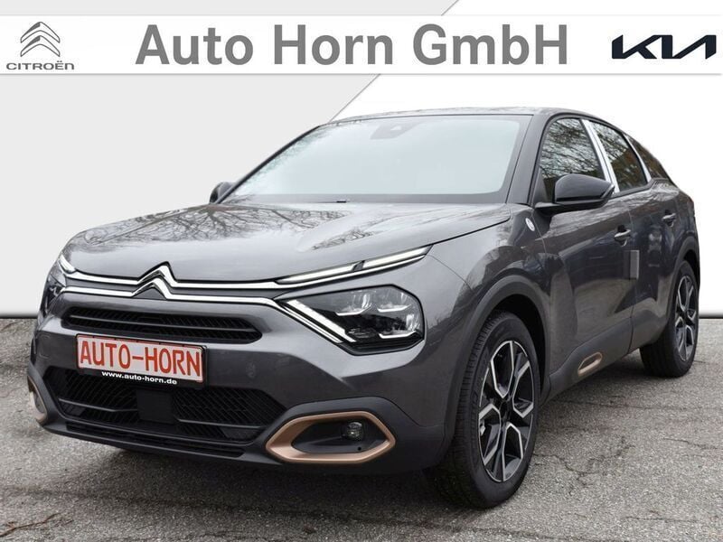 Grau Gebraucht 2023 Citroën e-C4 Shine Limousine | 19.990 € (Superpreis) - Bild 1/4