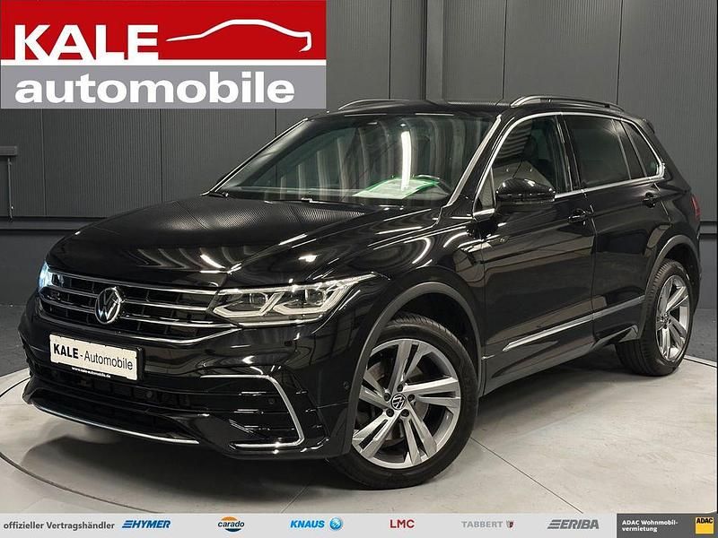 Schwarz metallic (deep black perleffekt) Gebraucht 2021 VW Tiguan R-line SUV | 35.670 € (Fairer Preis) - Bild 1/4